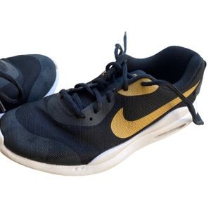 Black Nike gold swoosh size 5